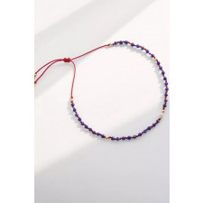 Pleciona bransoletka z lapisu lazuli na czerwonym sznurku